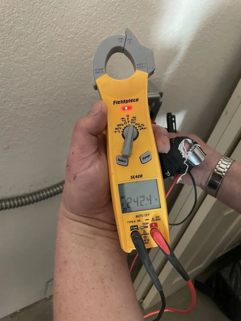 Voltage testing with clamp meter during Generator Installation in Pico Rivera